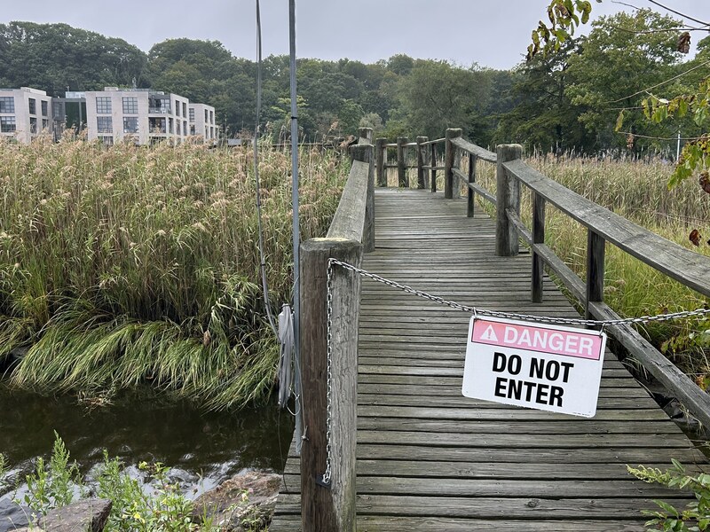 Wooden footbridge closed to pedestrians