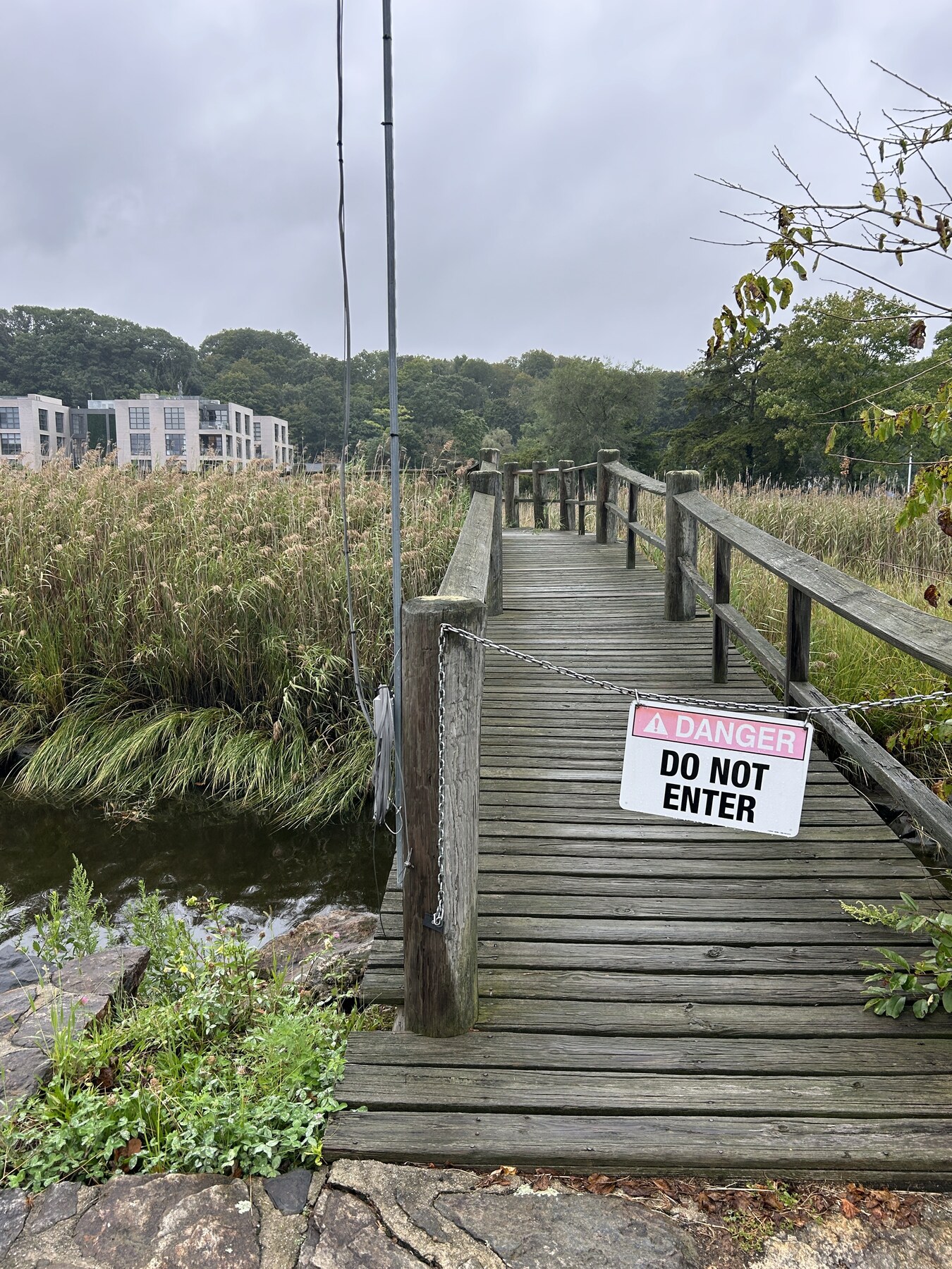 Wooden footbridge closed to pedestrians